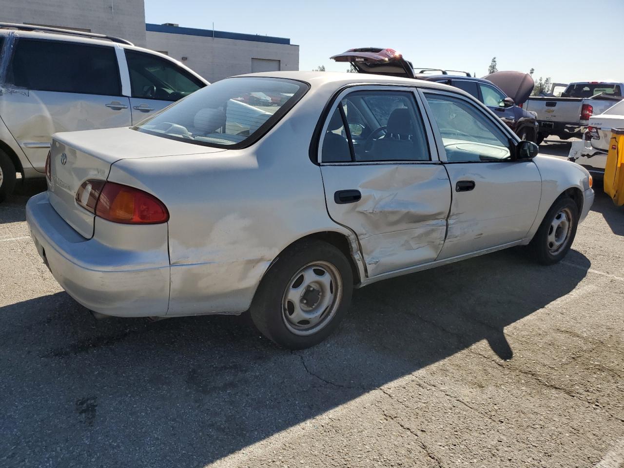 2000 Toyota Corolla VIN 1NXBR12E7YZ415460 Copart auction photo, side / rear end damage thumbnail 3