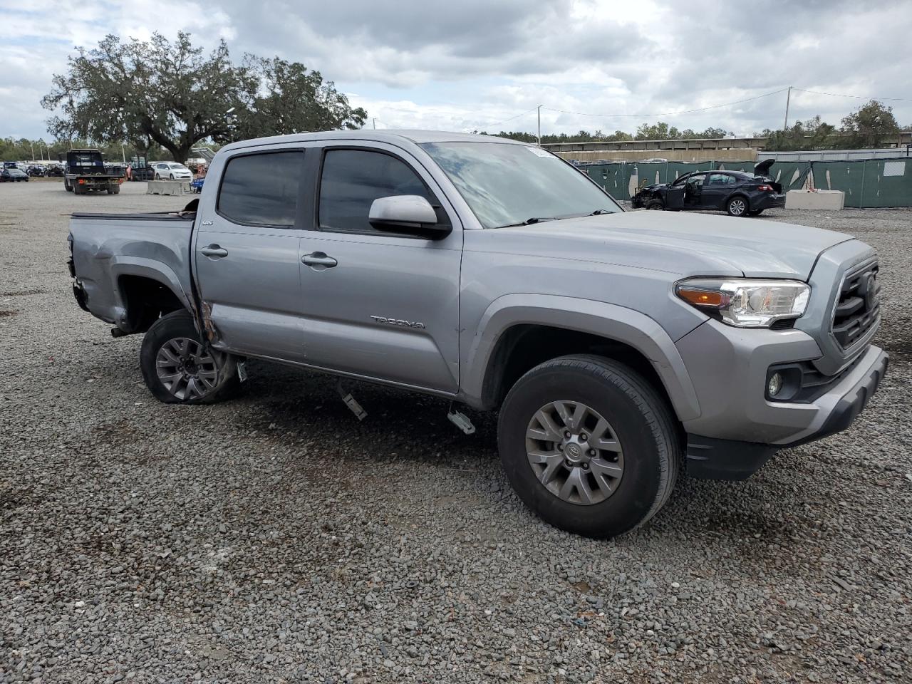 2019 Toyota Tacoma VIN 3TMAZ5CN8KM109398 Copart auction photo, side / undercarriage damage thumbnail 4