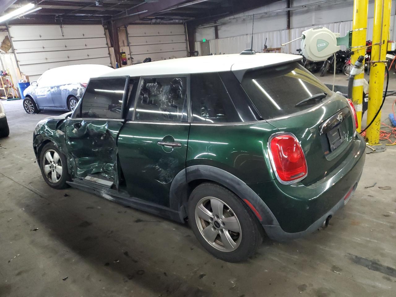 2016 MINI Cooper VIN WMWXU1C52G2D10553 Copart auction photo, side damage thumbnail 2