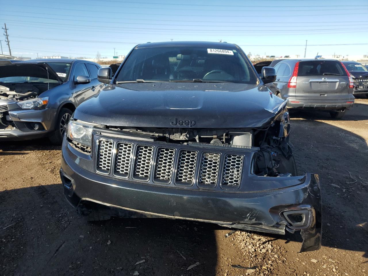 2015 Jeep Grand Cherokee VIN 1C4RJFAG8FC767556 Copart auction photo, undercarriage / front end damage thumbnail 5