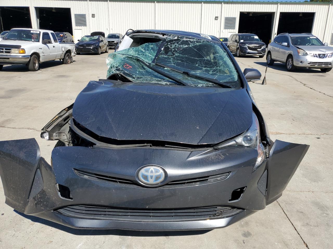 2017 Toyota Prius VIN JTDKBRFU7H3031998 Copart auction photo, all over damage thumbnail 5
