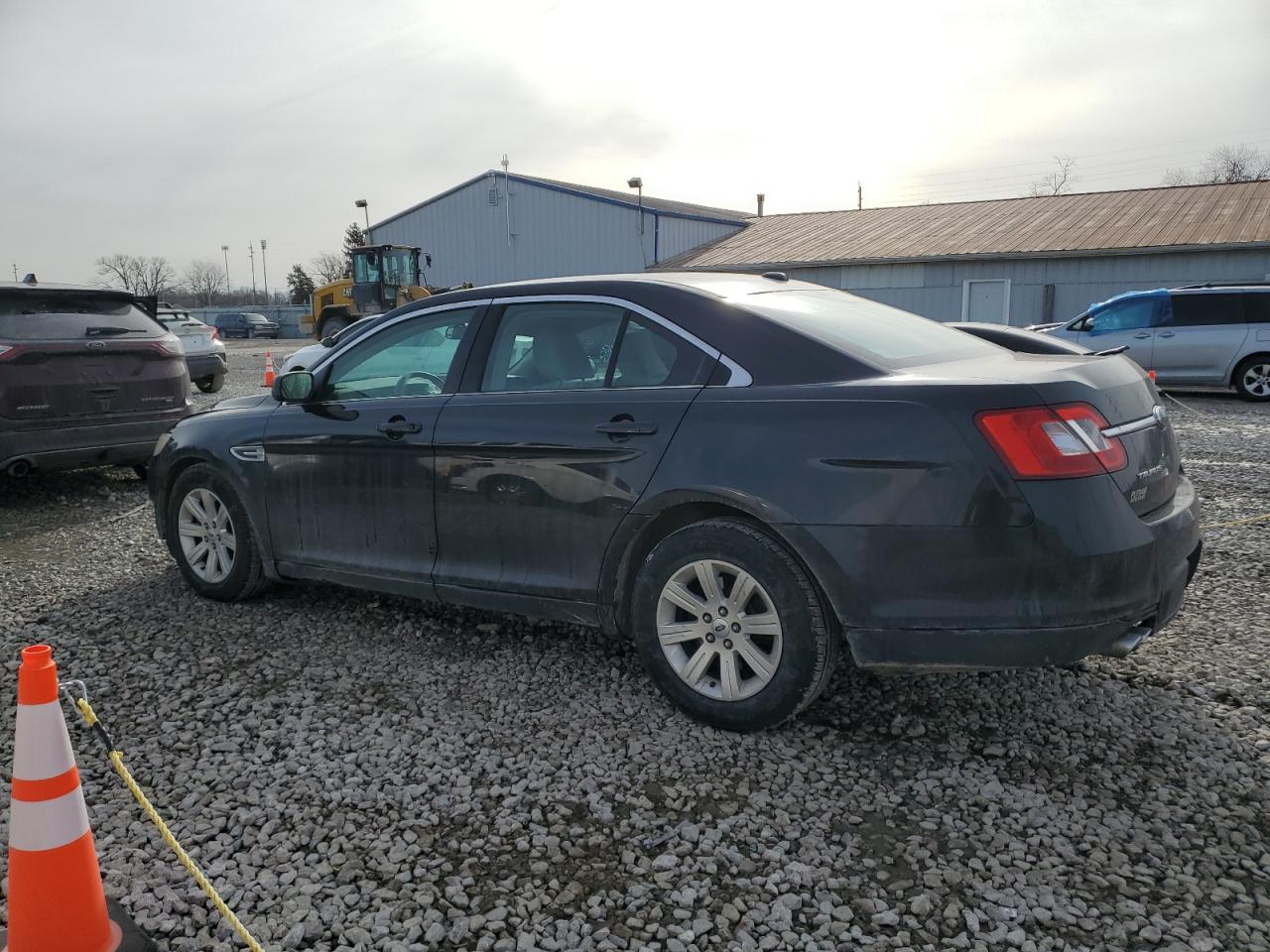 2010 Ford Taurus VIN 1FAHP2DW0AG128990 Copart auction photo, front end damage thumbnail 2