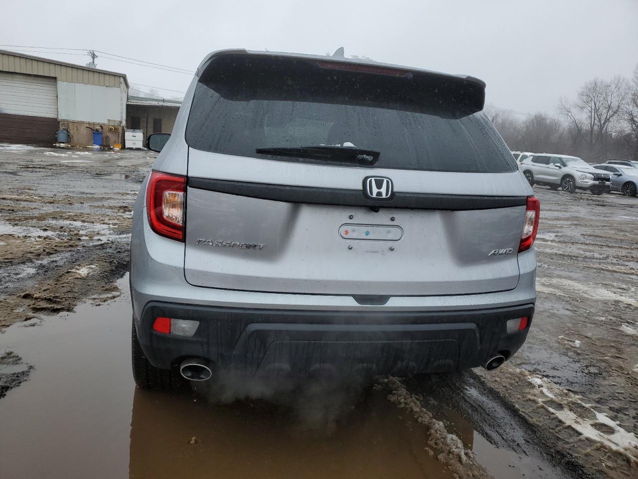 2021 Honda Passport VIN 5FNYF8H50MB033538 Copart auction photo, front end / side damage thumbnail 6