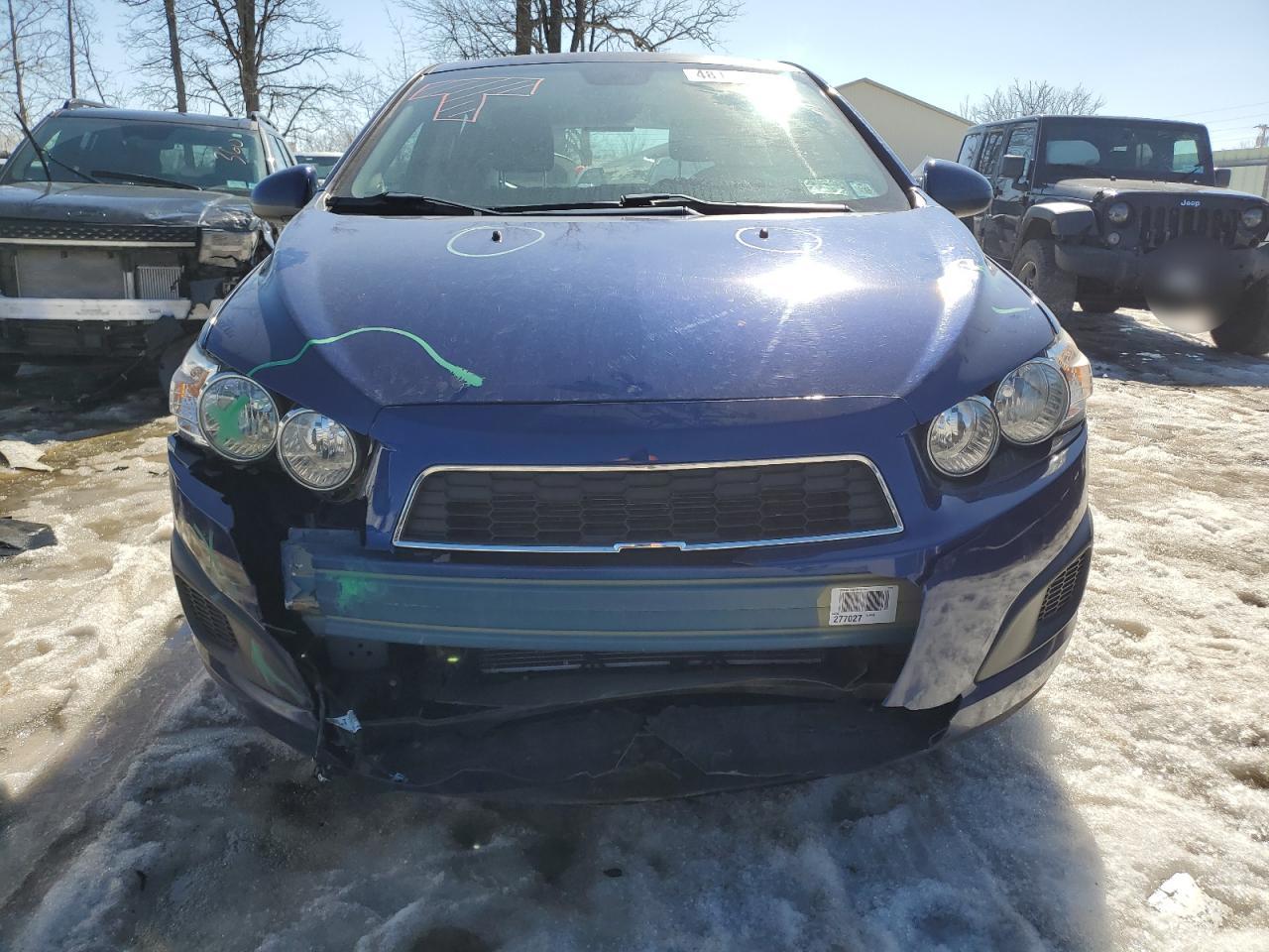 2013 Chevrolet Sonic VIN 1G1JC6SGXD4241645 Copart auction photo, front end / minor dent/scratches damage thumbnail 5