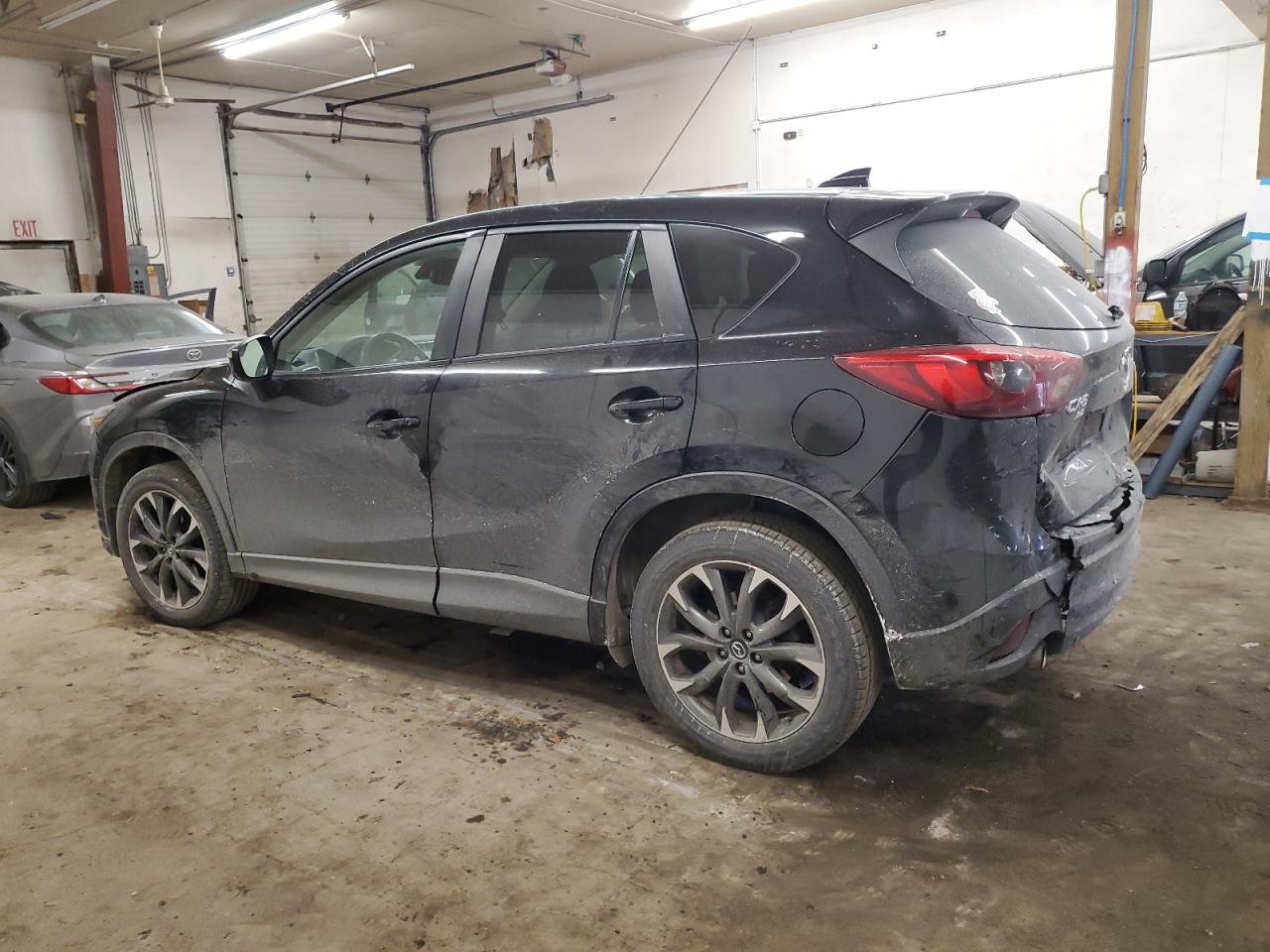 2016 Mazda CX-5 VIN JM3KE4DY0G0850875 Copart auction photo, front end / rear end damage thumbnail 2