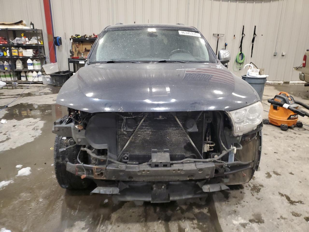 2012 Dodge Durango VIN 1C4RDJEG1CC205028 Copart auction photo, front end / side damage thumbnail 5