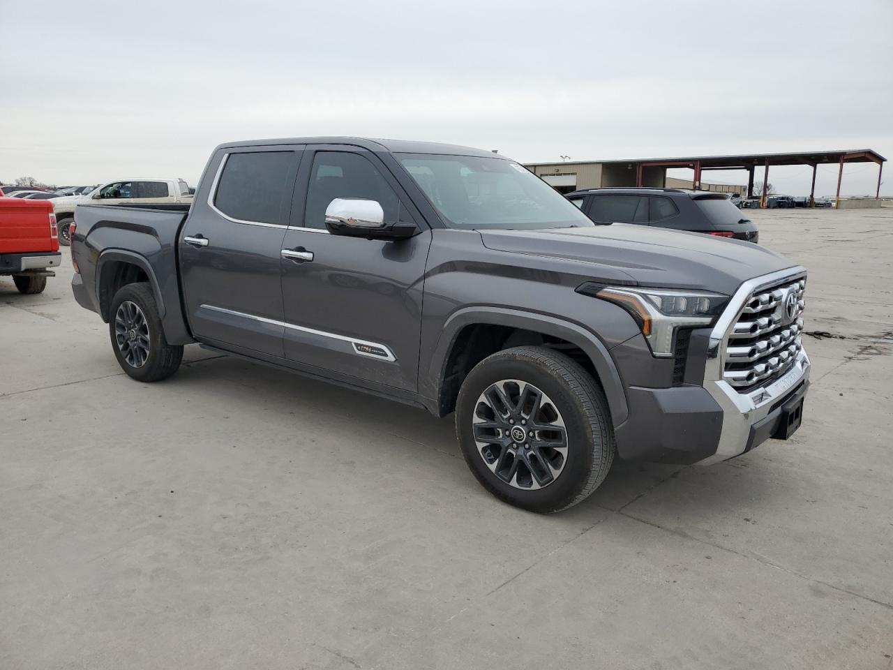2022 Toyota Tundra VIN 5TFMA5DB4NX001531 Copart auction photo, missing/altered vin / hail damage thumbnail 4