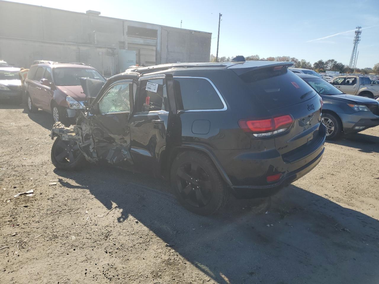 2015 Jeep Grand Cherokee VIN 1C4RJFAG0FC134873 Copart auction photo, front end / side damage thumbnail 3