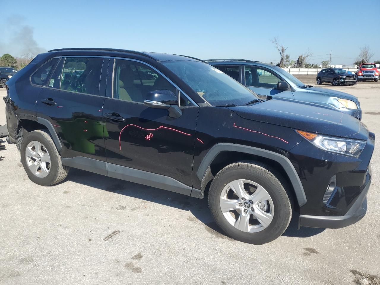 2021 Toyota RAV 4 VIN 2T3W1RFV7MW104873 Copart auction photo, rear end / minor dent/scratches damage thumbnail 4
