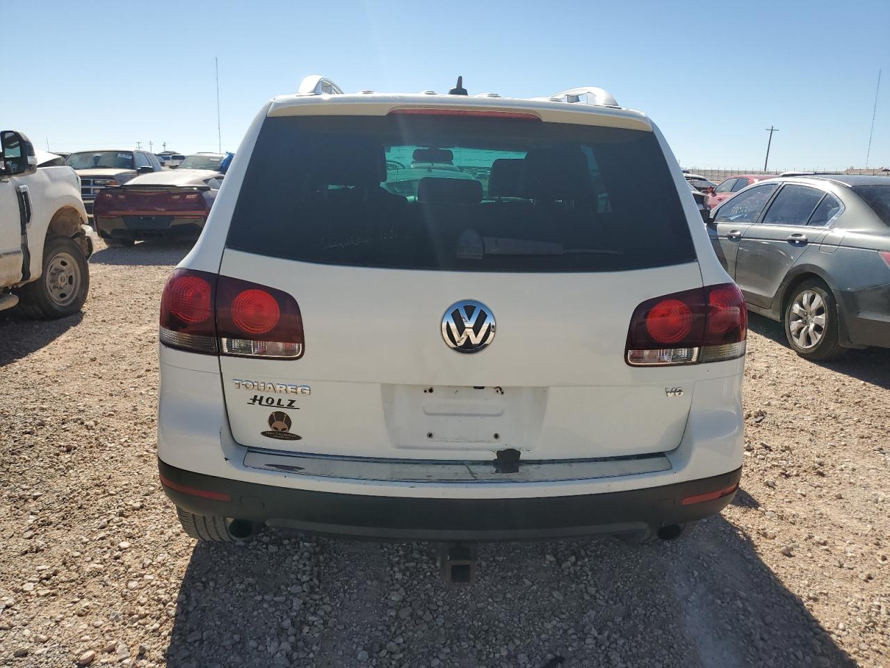 2008 Volkswagen Touareg VIN WVGBE77L18D064499 Copart auction photo, front end / side damage thumbnail 6
