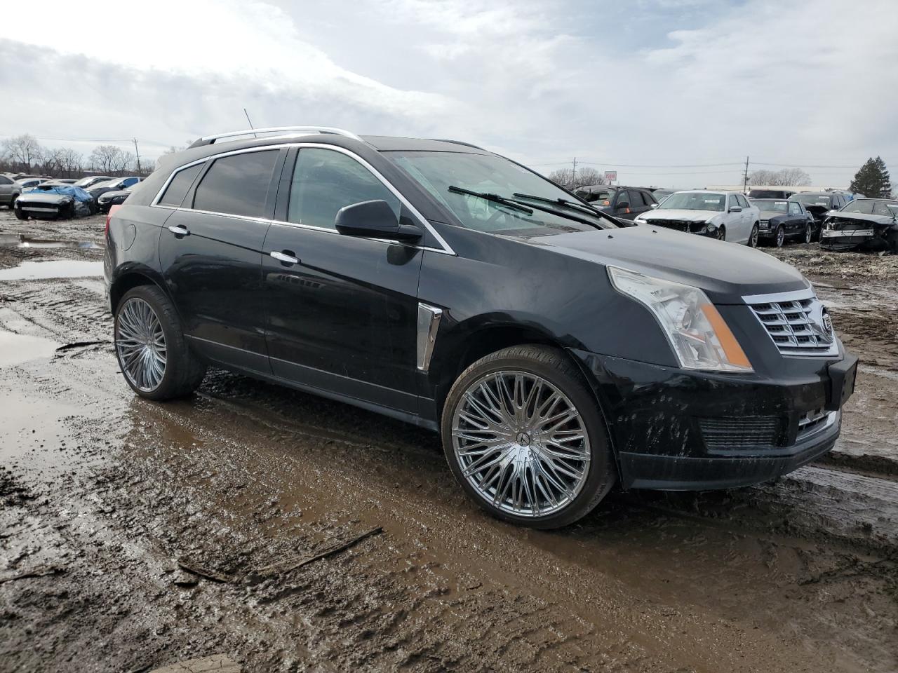 2016 Cadillac SRX VIN 3GYFNEE32GS541026 Copart auction photo, side / rear end damage thumbnail 4