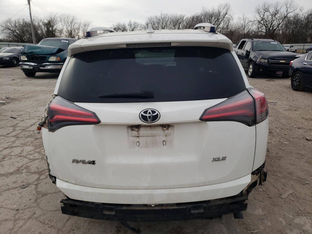 2017 Toyota RAV 4 VIN JTMWFREV7HJ110163 Copart auction photo, side / rear end damage thumbnail 6