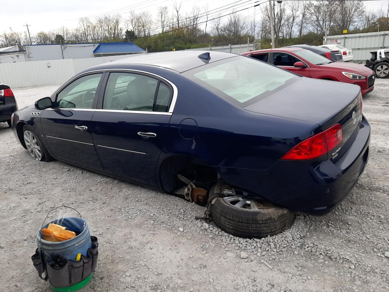 2009 Buick Lucerne VIN 1G4HD57M29U125838 Copart auction photo, undercarriage damage thumbnail 2