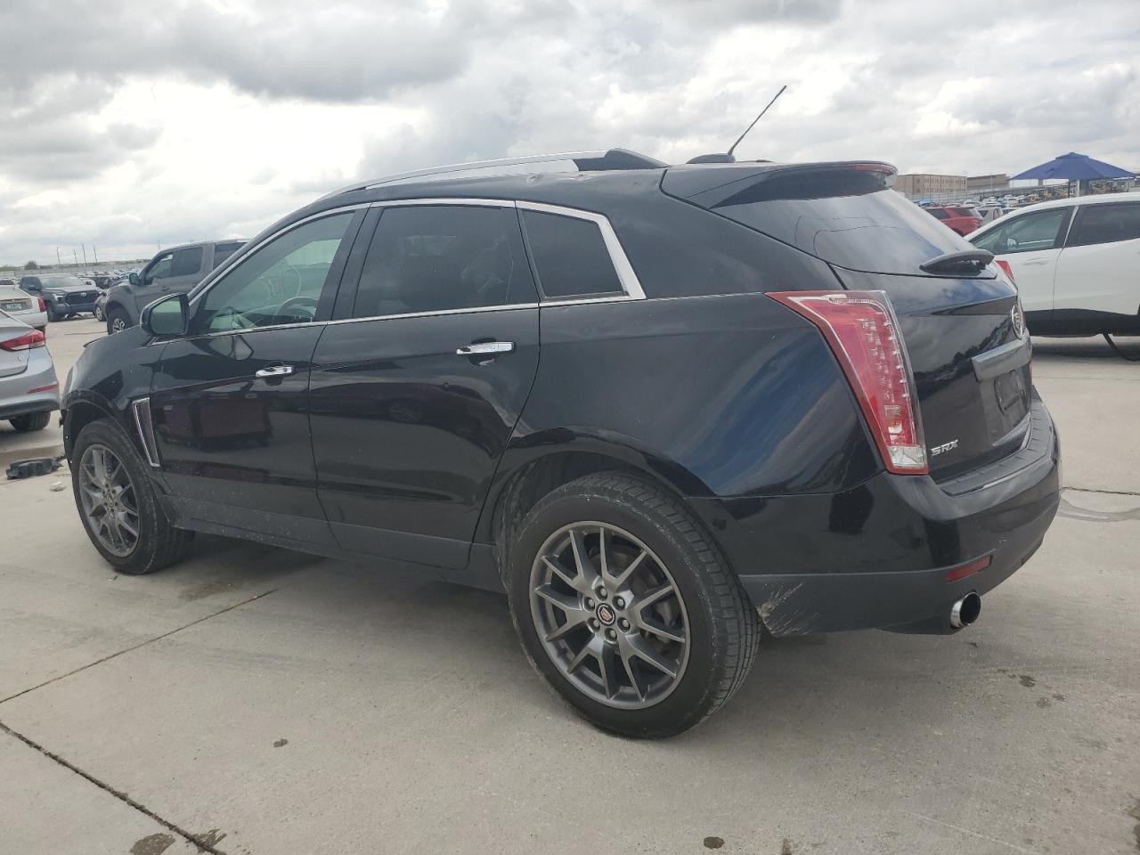 2016 Cadillac SRX VIN 3GYFNDE34GS569520 Copart auction photo, front end damage thumbnail 2