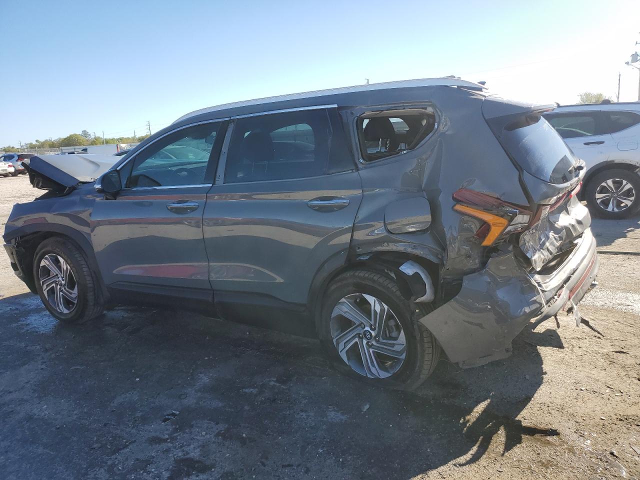 2023 Hyundai Santa Fe VIN 5NMS24AJ7PH601756 Copart auction photo, front end / rear end damage thumbnail 2