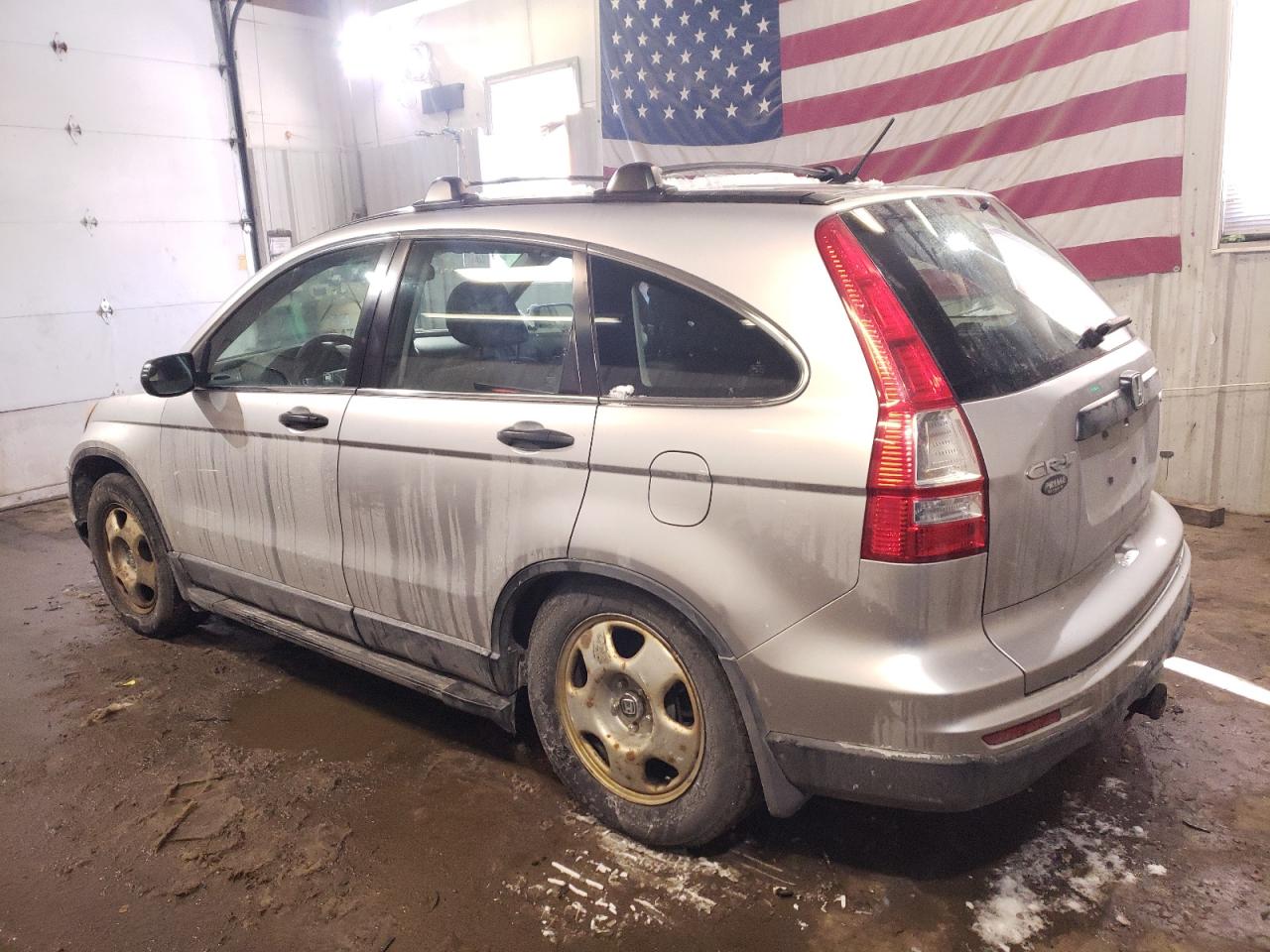 2010 Honda CR-V VIN JHLRE4H32AC002477 Copart auction photo, undercarriage / minor dent/scratches damage thumbnail 2