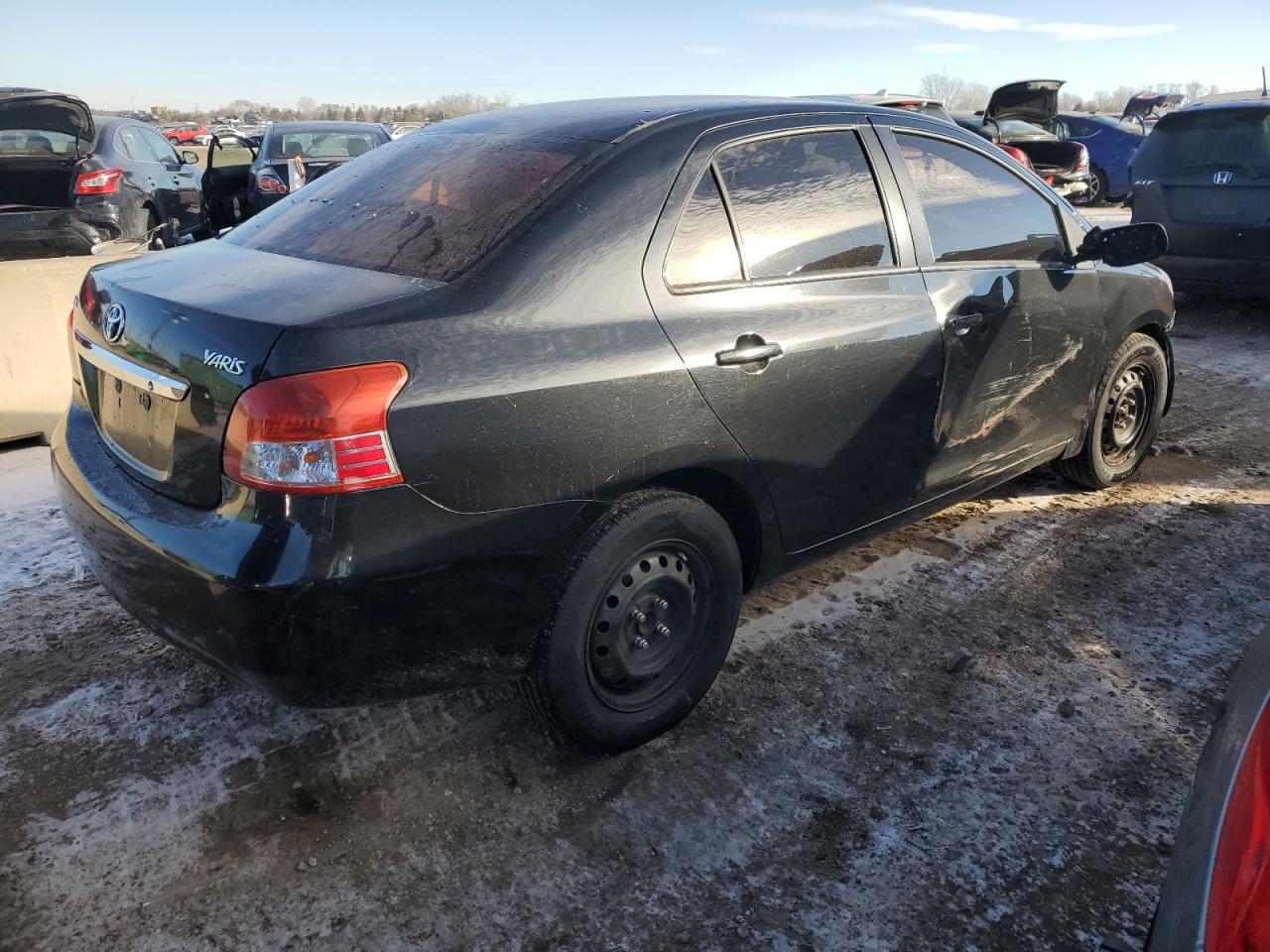 2009 Toyota Yaris VIN JTDBT903394045146 Copart auction photo, all over damage thumbnail 3