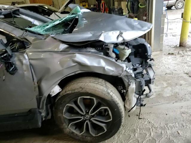 2021 Honda CR-V VIN 2HKRW2H85MH663990 Copart auction photo, rollover / all over damage thumbnail 11