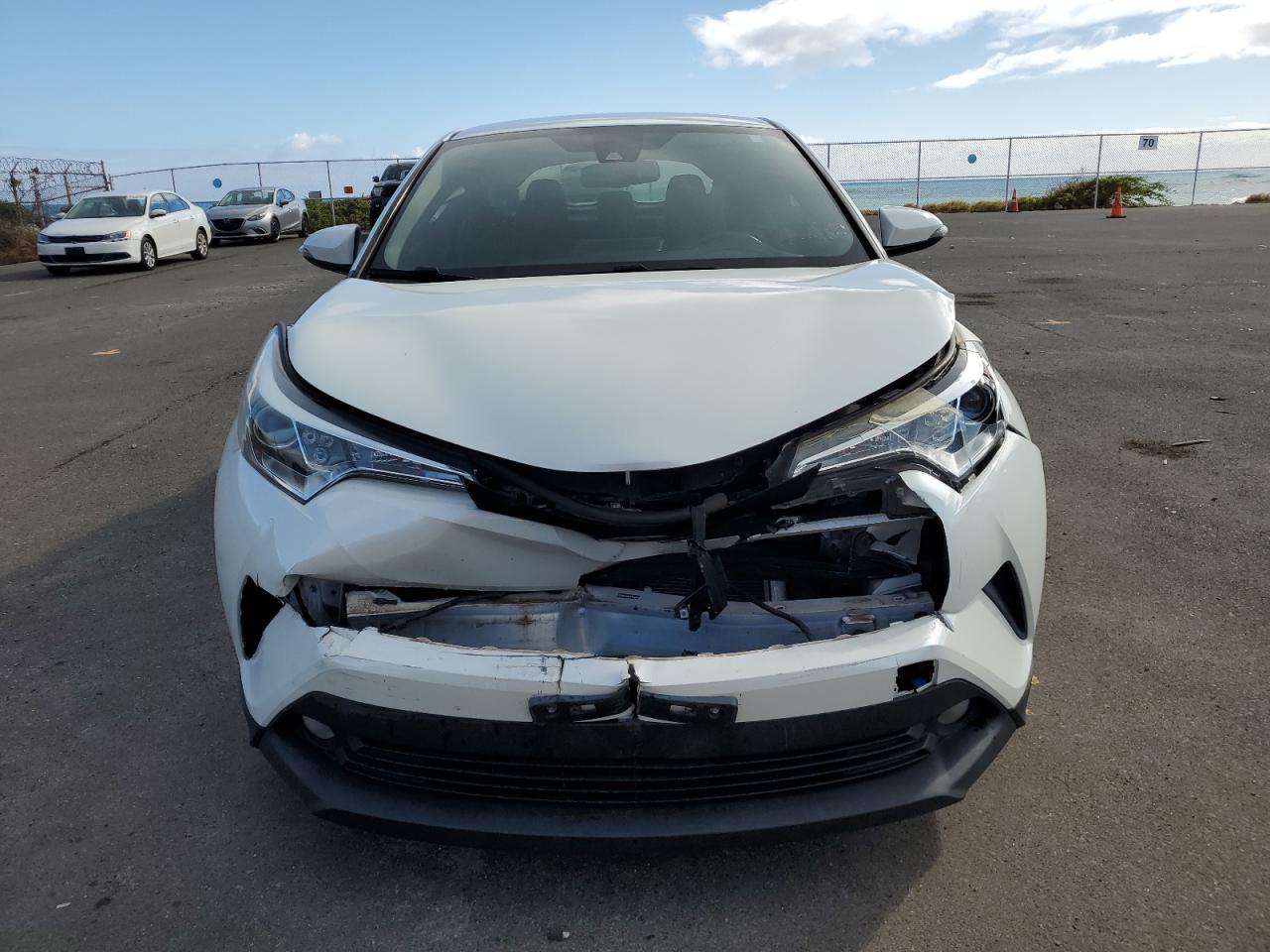 2018 Toyota C-HR VIN NMTKHMBXXJR042935 Copart auction photo, front end damage thumbnail 5