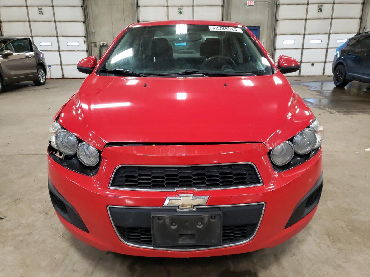 2015 Chevrolet Sonic VIN 1G1JC5SH4F4144706 Copart auction photo, front end / side damage thumbnail 5
