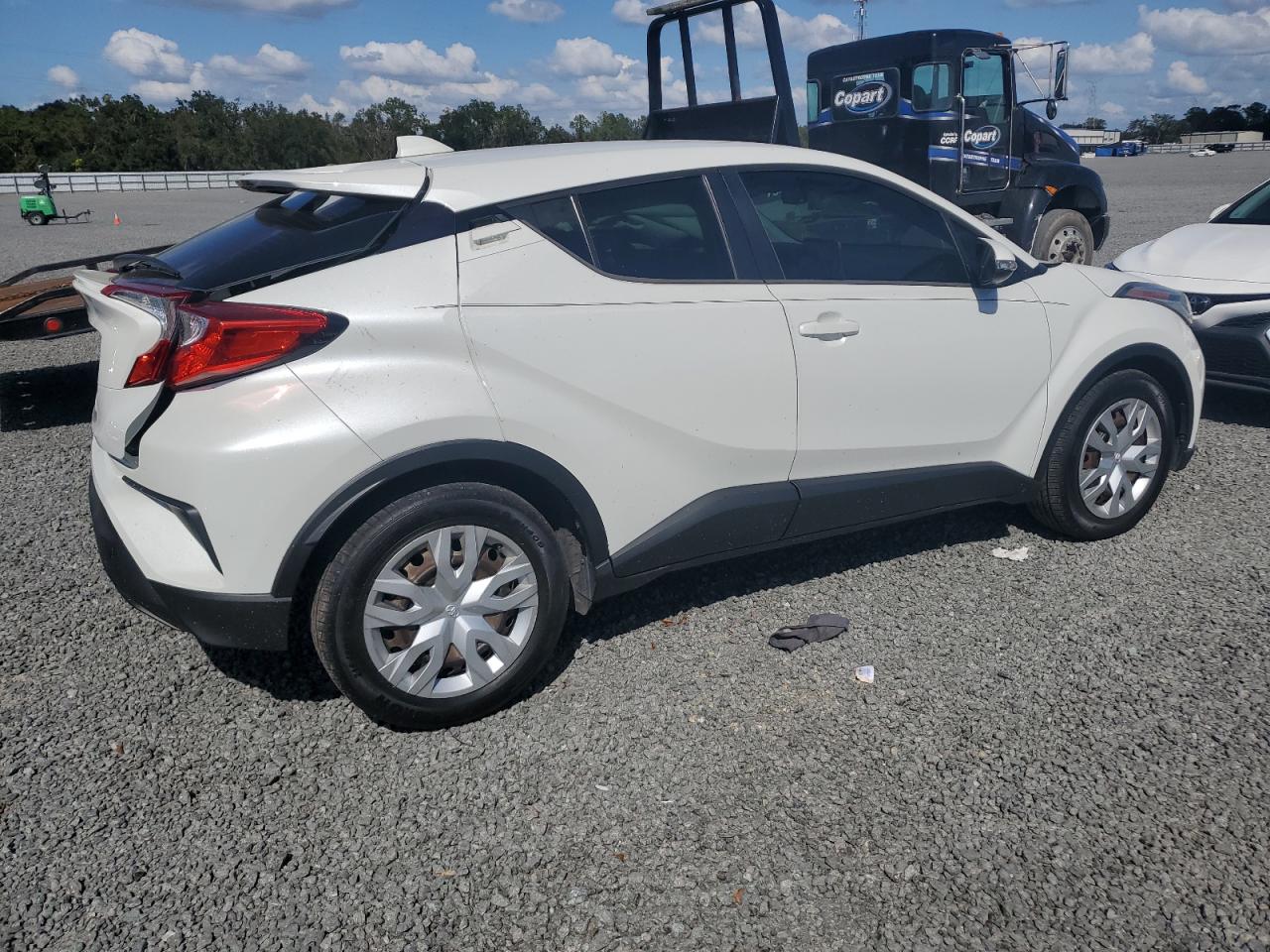 2021 Toyota C-HR VIN NMTKHMBX9MR120674 Copart auction photo, side damage thumbnail 3