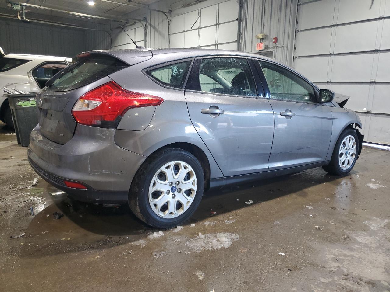 2012 Ford Focus VIN 1FAHP3K20CL306610 Copart auction photo, front end / rear end damage thumbnail 3