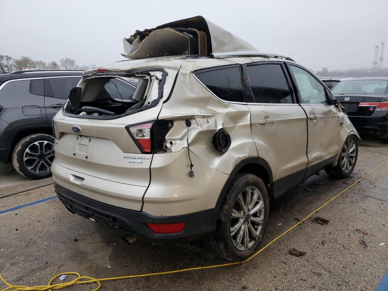 2017 Ford Escape VIN 1FMCU0JD9HUE09276 Copart auction photo, rollover damage thumbnail 3