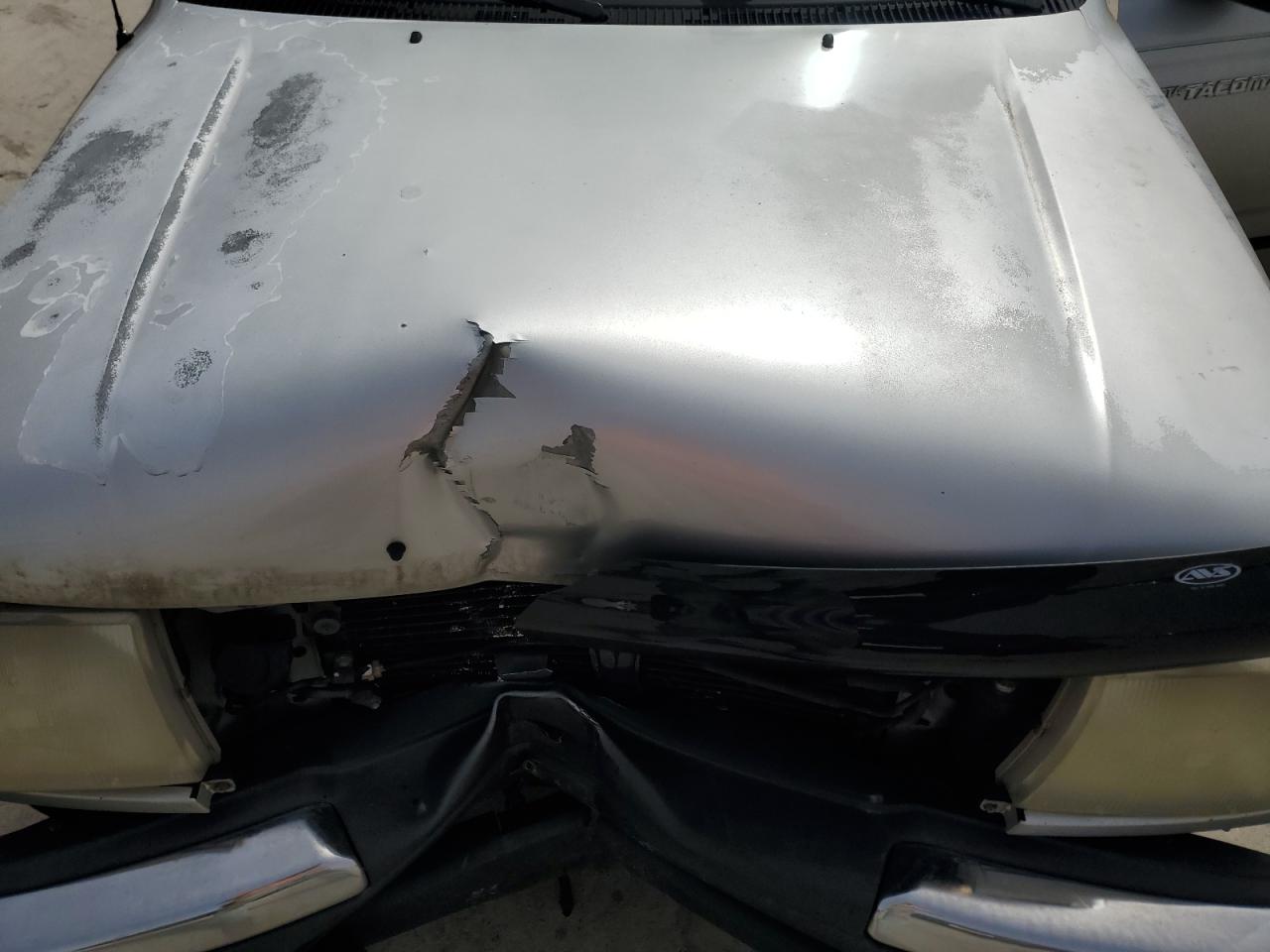 2000 Toyota Tacoma VIN 5TESN92N8YZ696366 Copart auction photo, front end / hail damage thumbnail 12