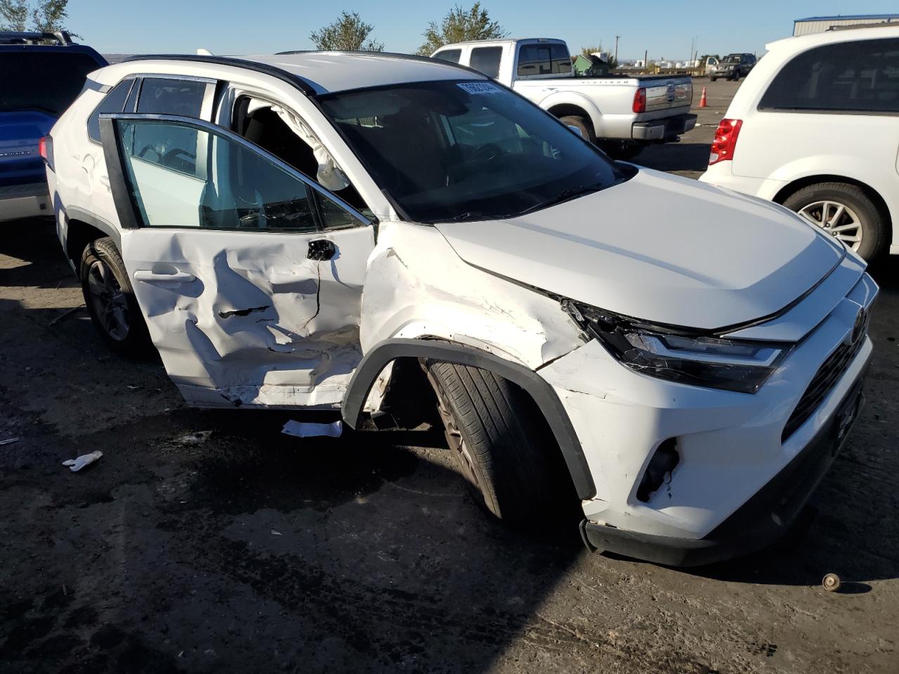 2022 Toyota RAV 4 VIN 2T3P1RFV9NW254702 Copart auction photo, side / front end damage thumbnail 4