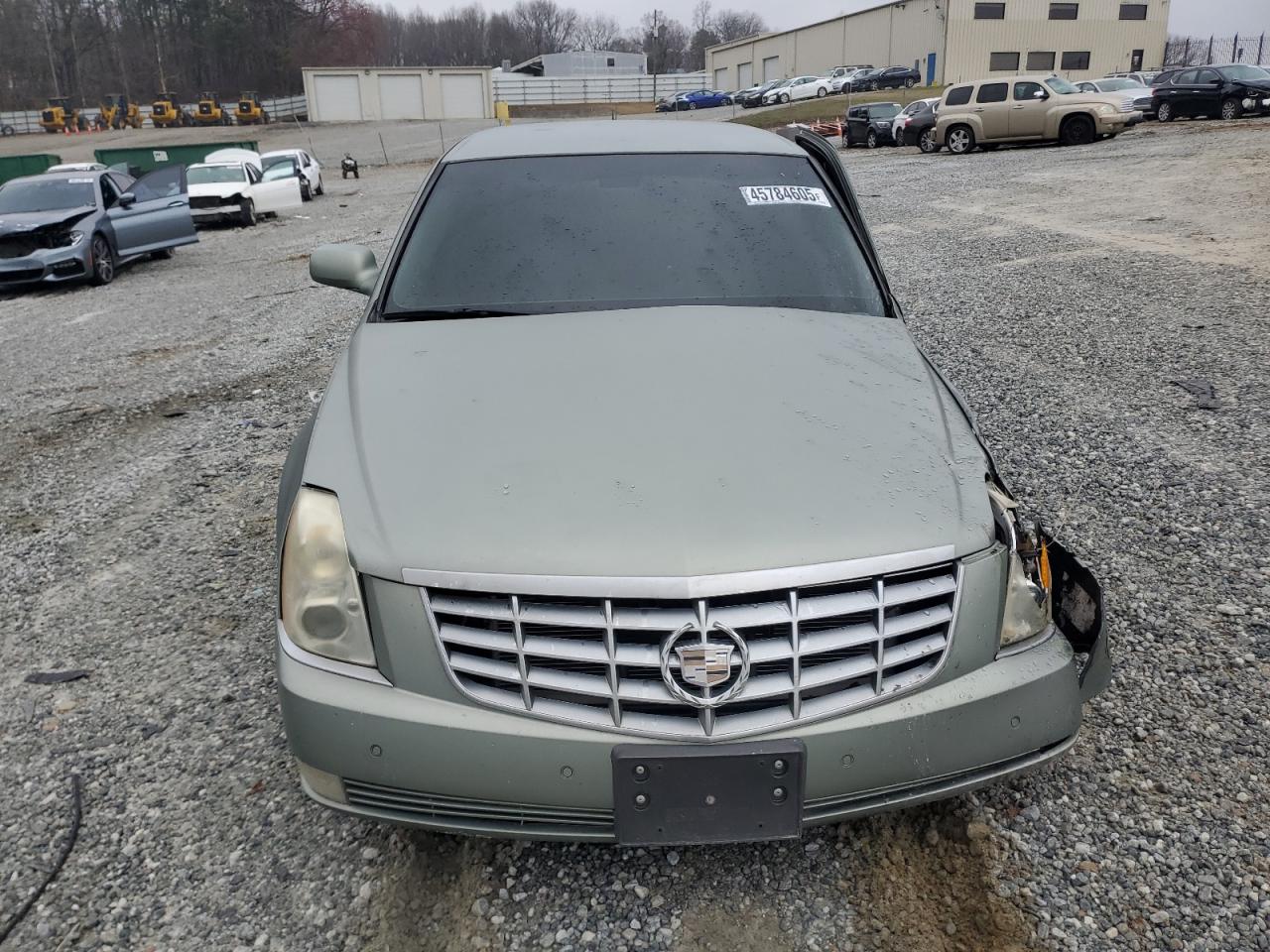 2006 Cadillac DTS VIN 1G6KD57YX6U193025 Copart auction photo, all over damage thumbnail 5