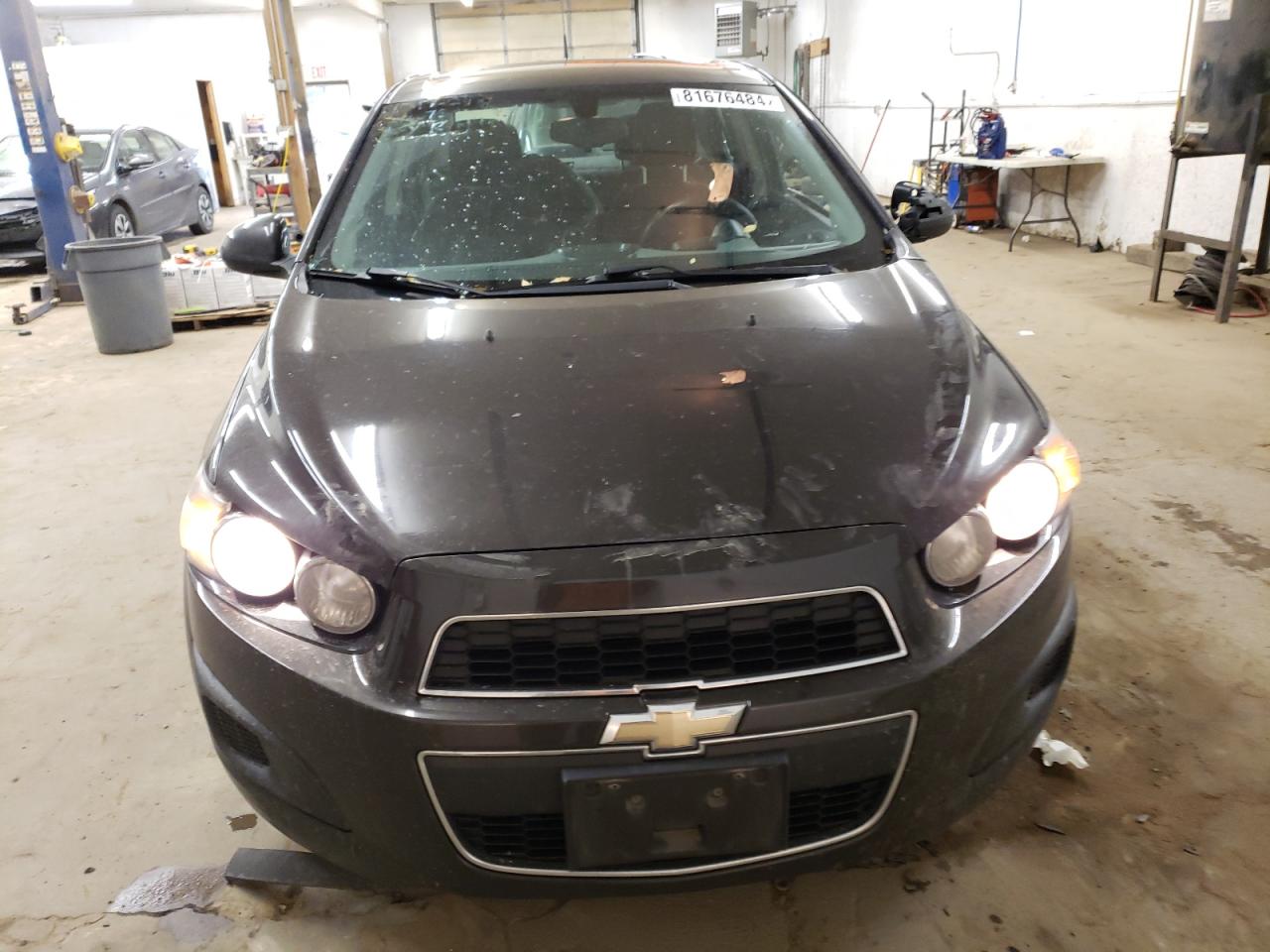 2014 Chevrolet Sonic VIN 1G1JC5SB3E4238733 Copart auction photo, side / front end damage thumbnail 5