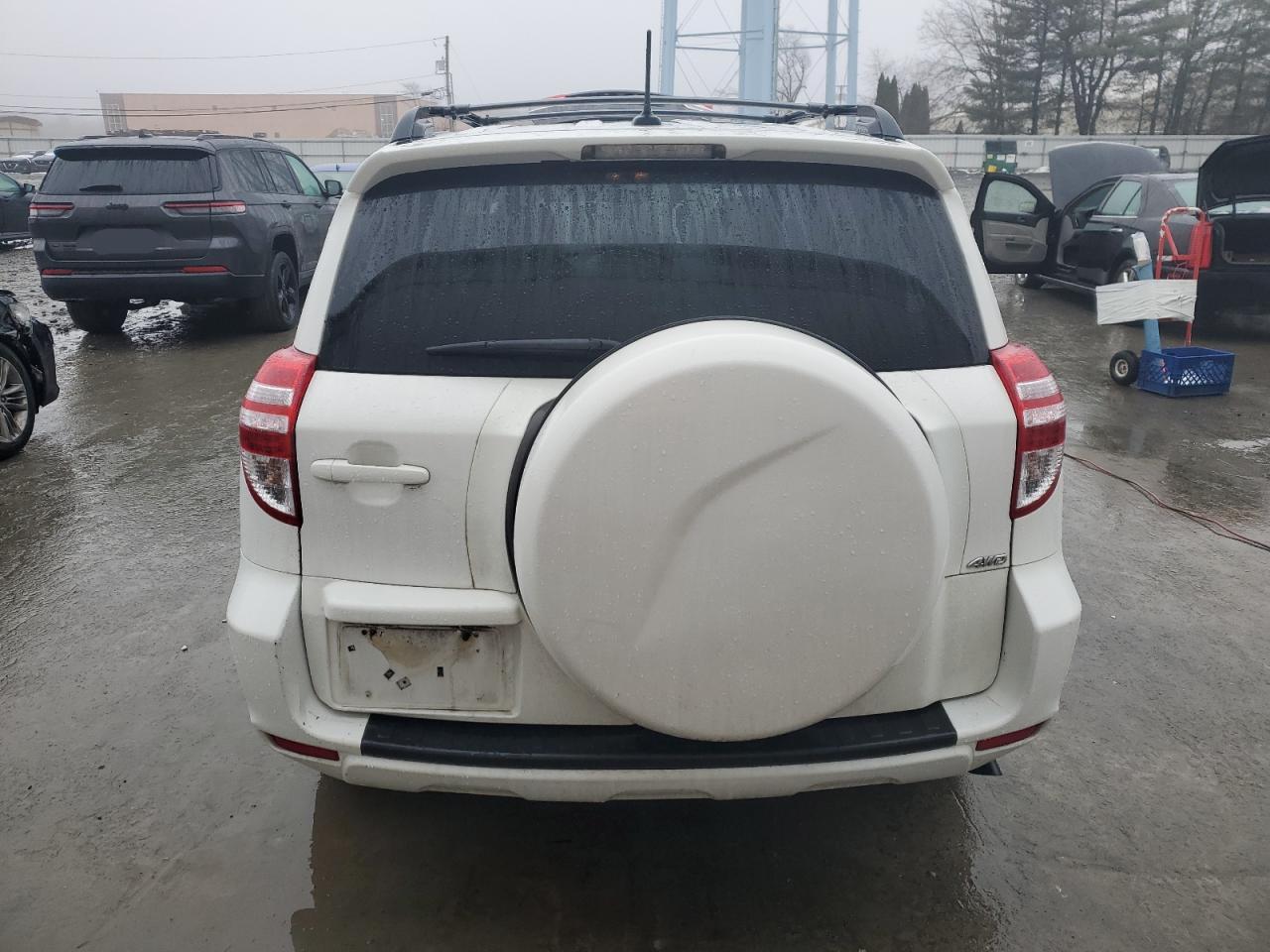 2012 Toyota RAV 4 VIN 2T3BF4DV4CW233657 Copart auction photo, side damage thumbnail 6