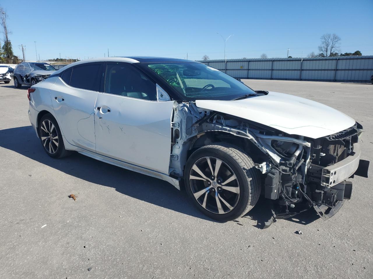 2016 Nissan Maxima VIN 1N4AA6AP7GC407134 Copart auction photo, all over damage thumbnail 4