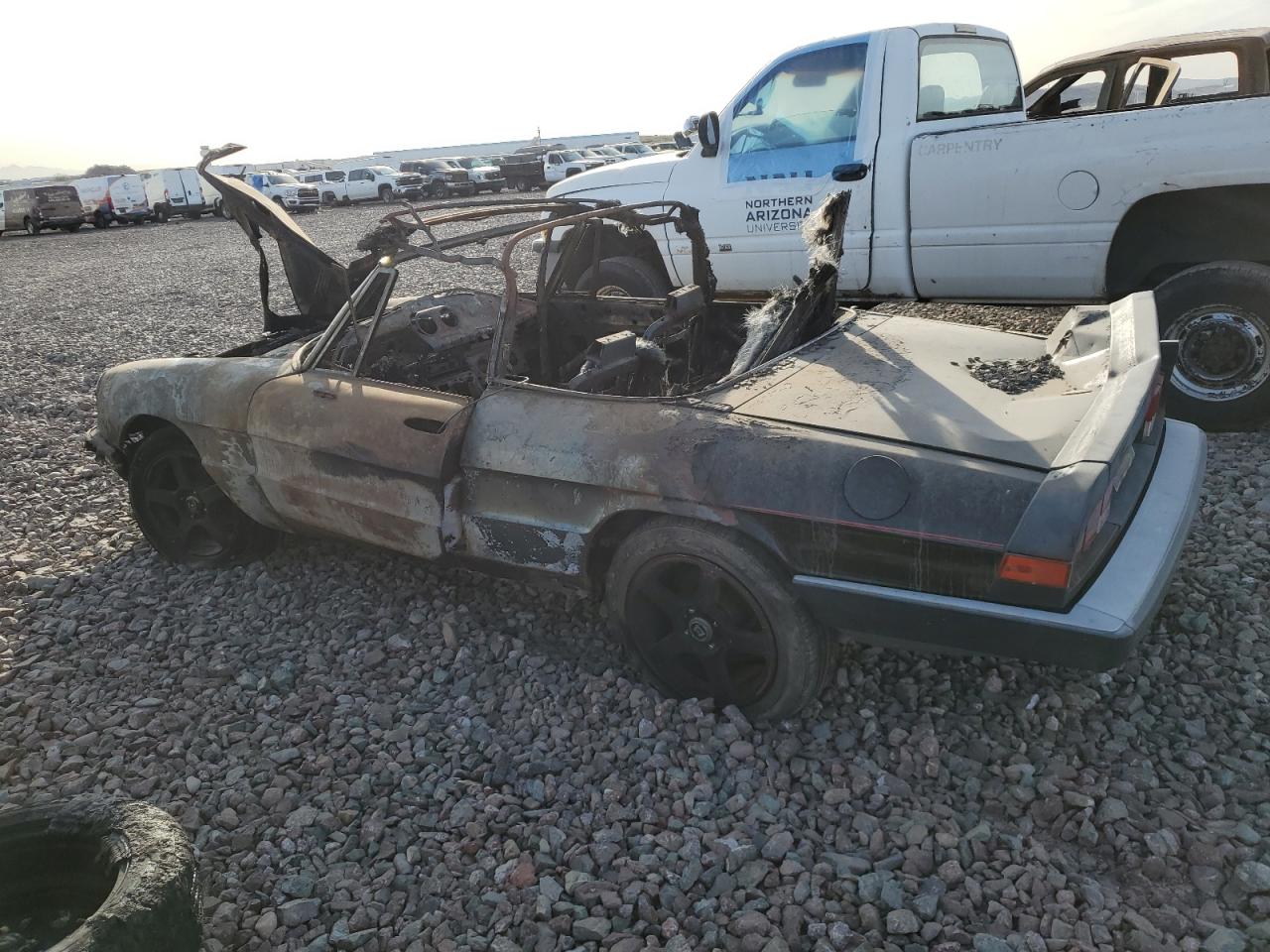 1988 Alfa Romeo Spider VIN ZARBA5585J1058172 Copart auction photo, burn damage thumbnail 2