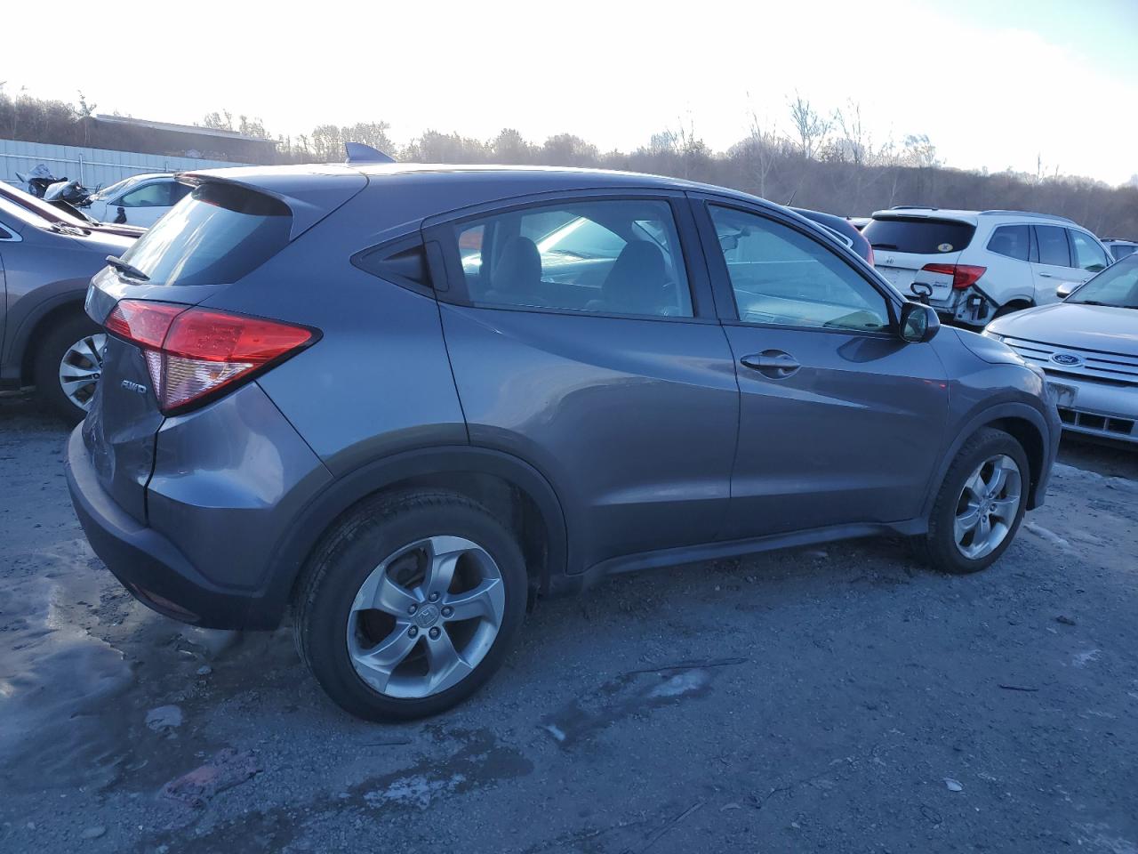 2018 Honda HR-V VIN 3CZRU6H31JG710206 Copart auction photo, rear end / minor dent/scratches damage thumbnail 3