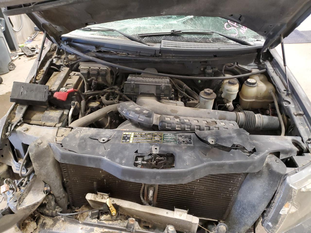 2004 Ford F-150 VIN 1FTPW14584KA58344 Copart auction photo, rollover damage thumbnail 11