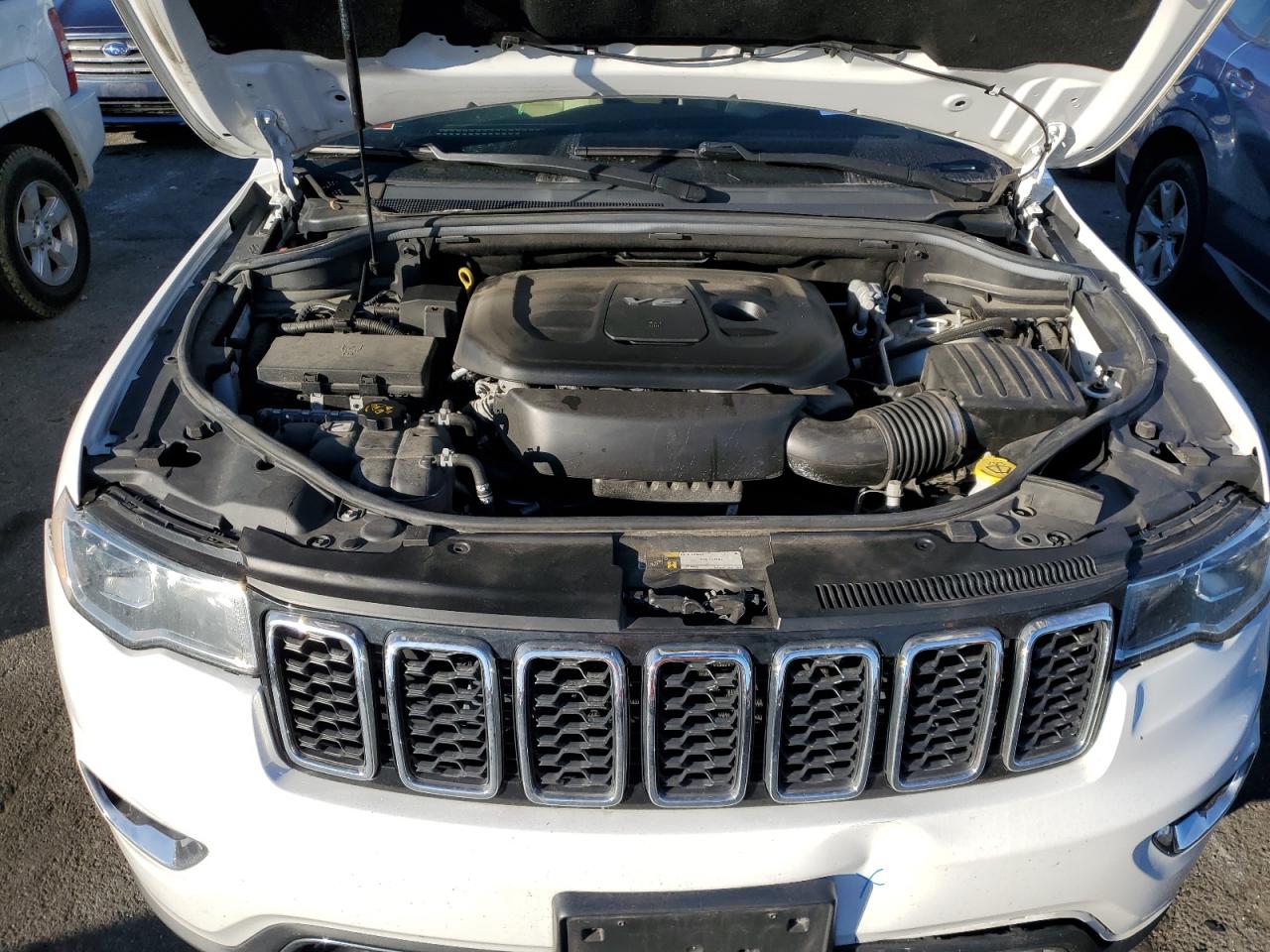 2018 Jeep Grand Cherokee VIN 1C4RJFBG2JC502882 Copart auction photo, front end / minor dent/scratches damage thumbnail 12