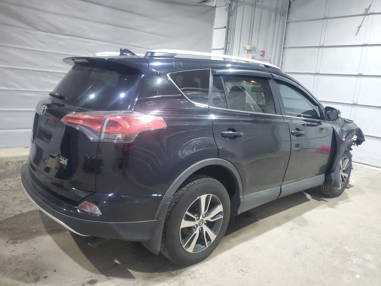 2016 Toyota RAV 4 VIN 2T3RFREV4GW510128 Copart auction photo, front end / minor dent/scratches damage thumbnail 3