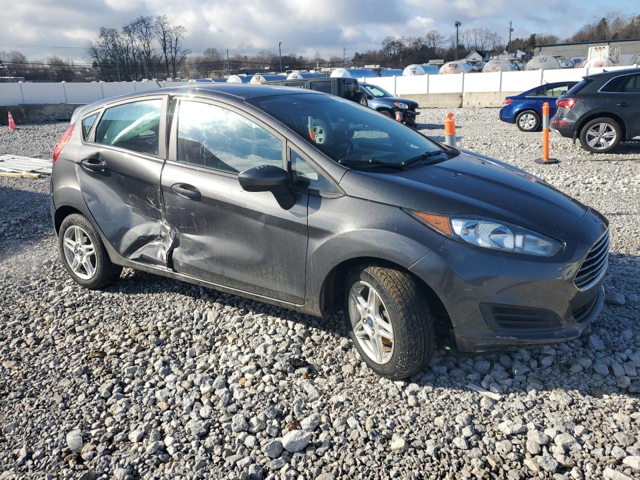 2019 Ford Fiesta VIN 3FADP4EJ8KM102982 Copart auction photo, side / front end damage thumbnail 4