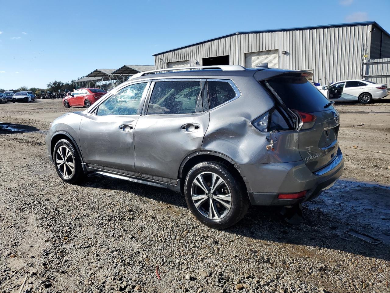 2017 Nissan Rogue VIN 5N1AT2MT9HC866121 Copart auction photo, side / rear end damage thumbnail 2