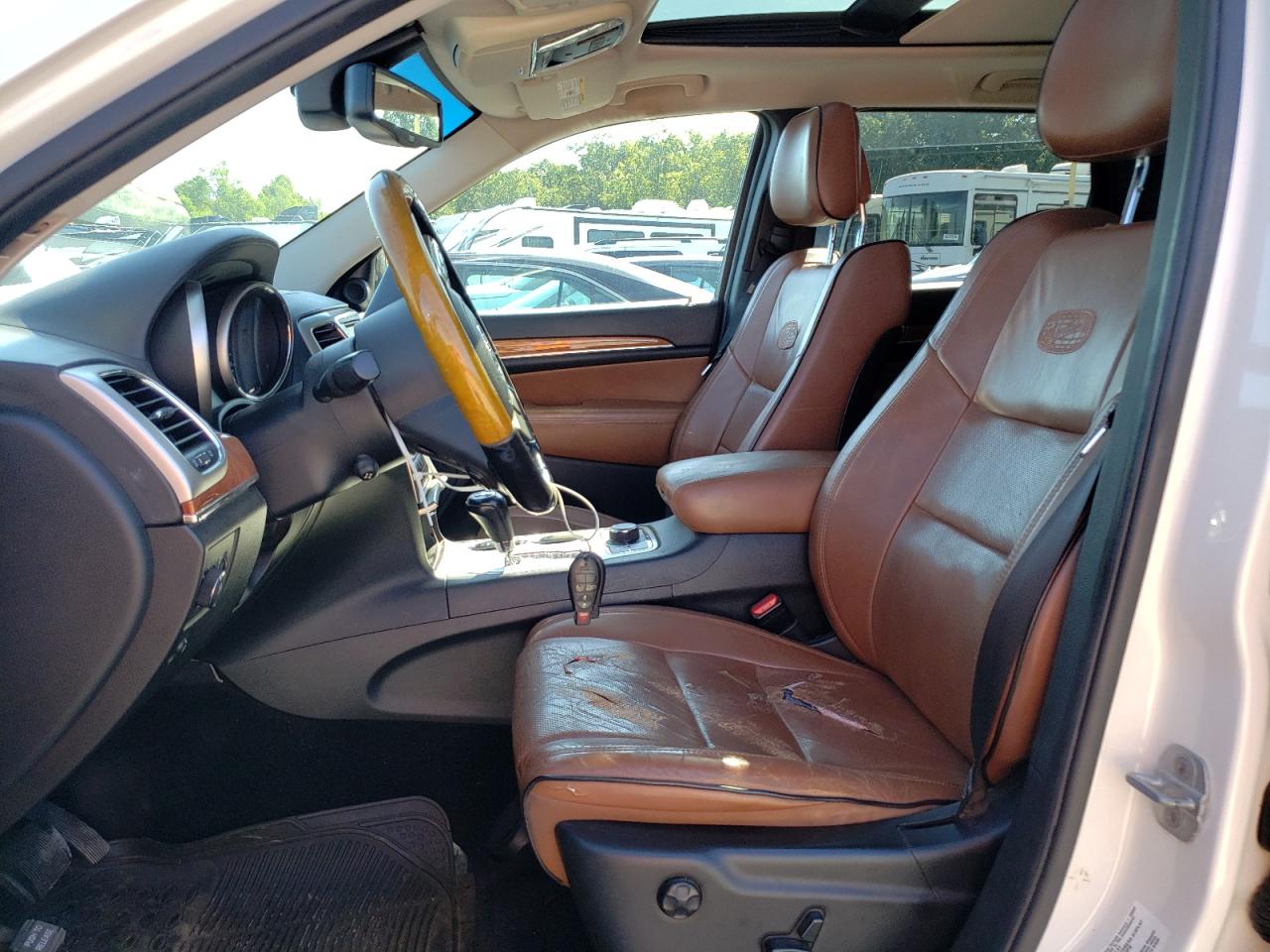 2012 Jeep Grand Cherokee VIN 1C4RJFCT2CC214746 Copart auction photo, hail damage thumbnail 7
