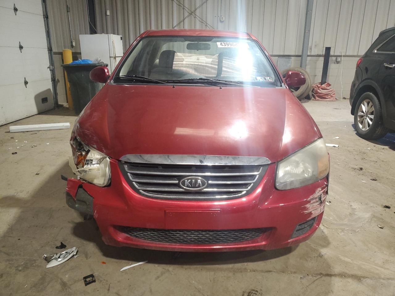 2009 KIA Spectra VIN KNAFE222895666204 Copart auction photo, side / front end damage thumbnail 5