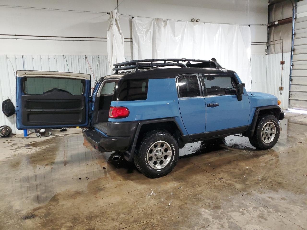 2011 Toyota FJ Cruiser VIN JTEBU4BF9BK113180 Copart auction photo, side / rear end damage thumbnail 3