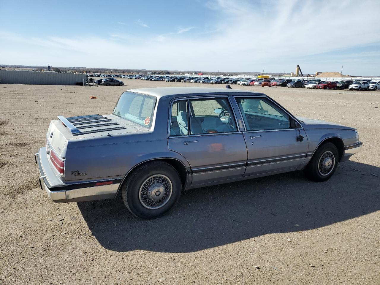 1990 Buick Park Avenue VIN 1G4CW54CXL1635282 Copart auction photo, front end / hail damage thumbnail 3