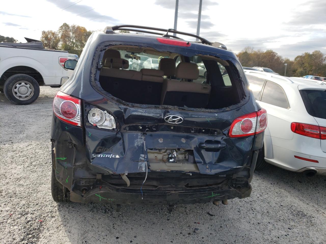 2012 Hyundai Santa Fe VIN 5XYZG3AB4CG108835 Copart auction photo, rear end damage thumbnail 6