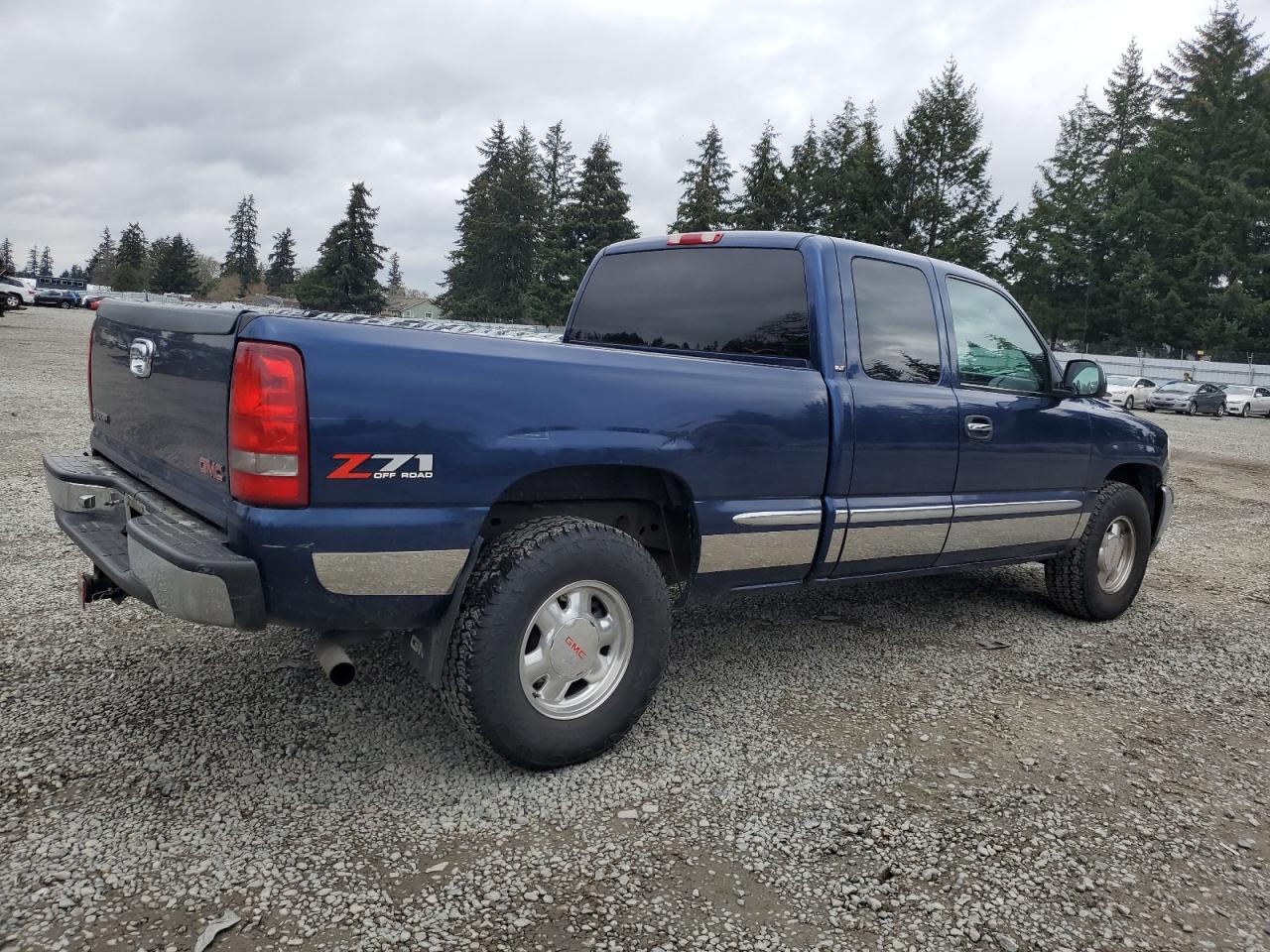 2001 GMC Sierra VIN 2GTEK19T511212255 Copart auction photo, side damage thumbnail 3