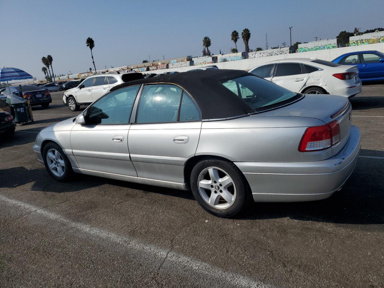 2000 Cadillac Catera VIN W06VR54R1YR003905 Copart auction photo, burn - engine / minor dent/scratches damage thumbnail 2