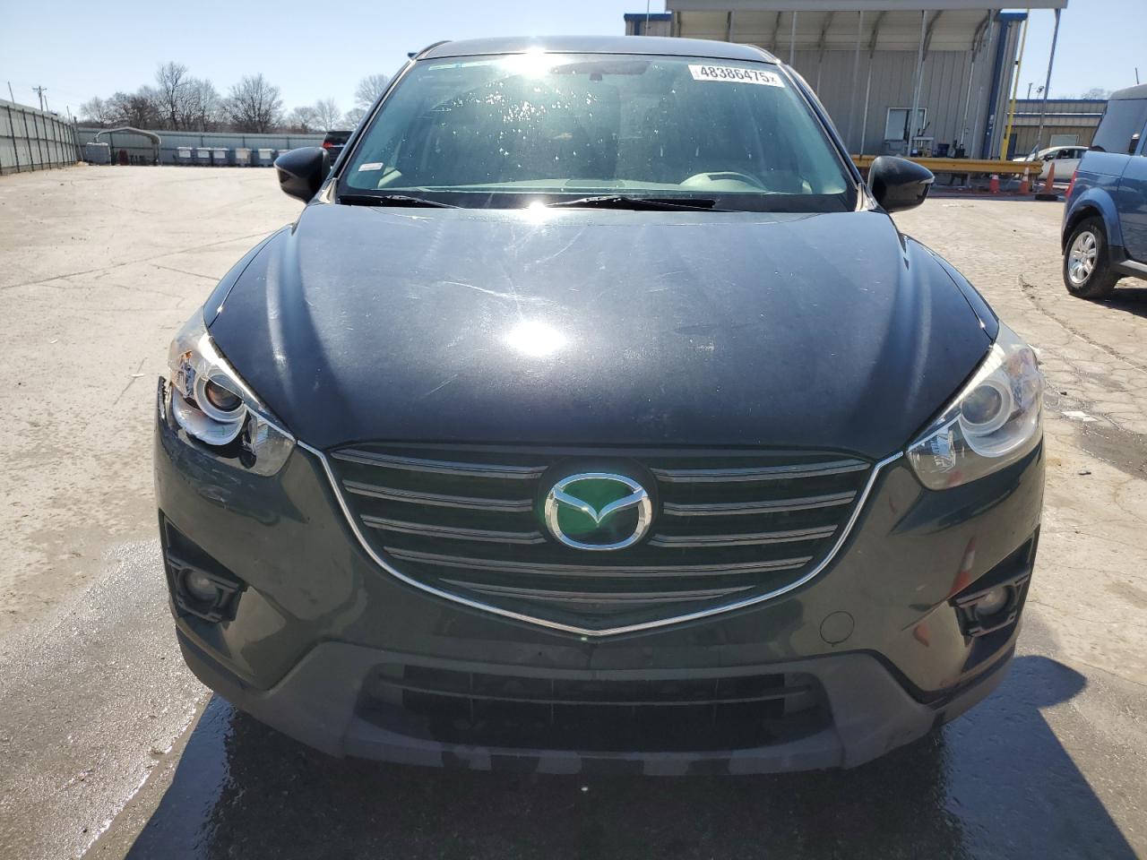 2016 Mazda CX-5 VIN JM3KE4CY2G0759527 Copart auction photo, side damage thumbnail 5