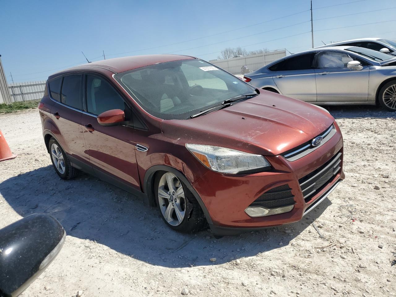 2014 Ford Escape VIN 1FMCU0GX0EUA61669 Copart auction photo, frame damage damage thumbnail 4
