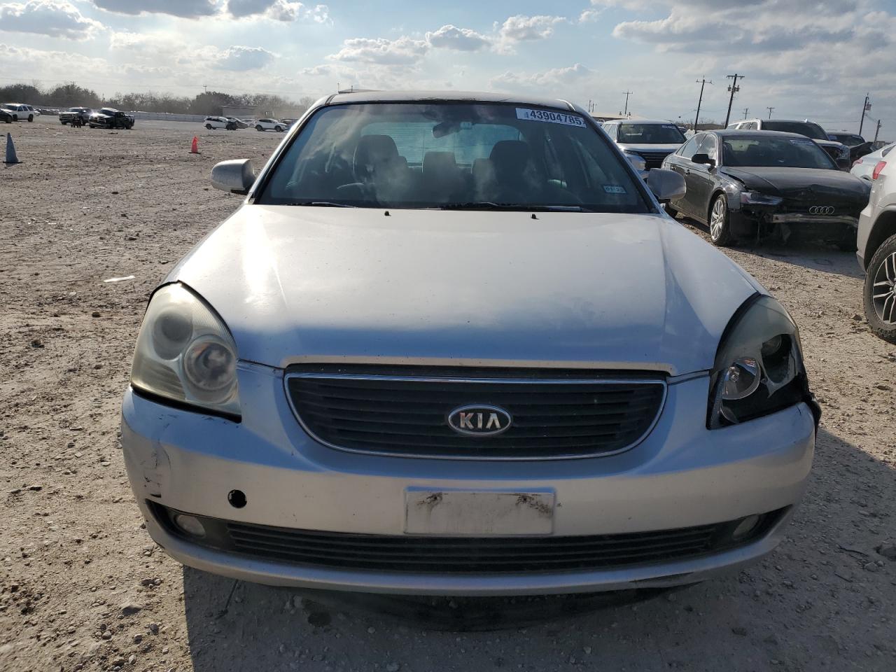2007 KIA Optima VIN KNAGE123375113383 Copart auction photo, front end / minor dent/scratches damage thumbnail 5